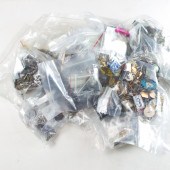 A GROUP OF SILVER AND METAL JE