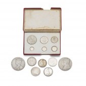 A GROUP OF SILVER COINS AND CO