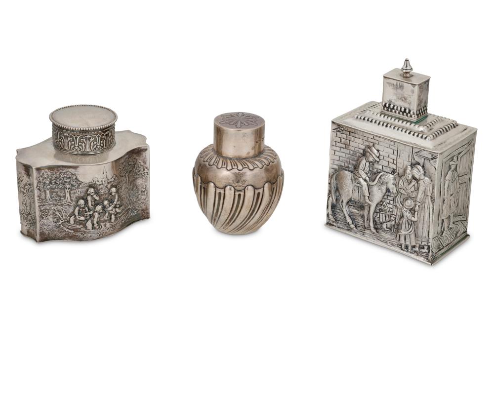 A GROUP OF SILVER TEA CADDIESA