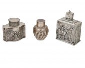 A GROUP OF SILVER TEA CADDIESA
