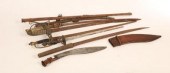A group of six bladed weapons,