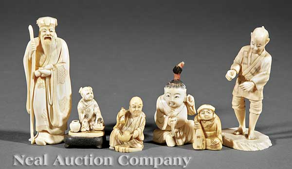 A Group of Six Japanese Carved