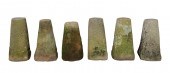 A GROUP OF SIX STADDLE STONE B