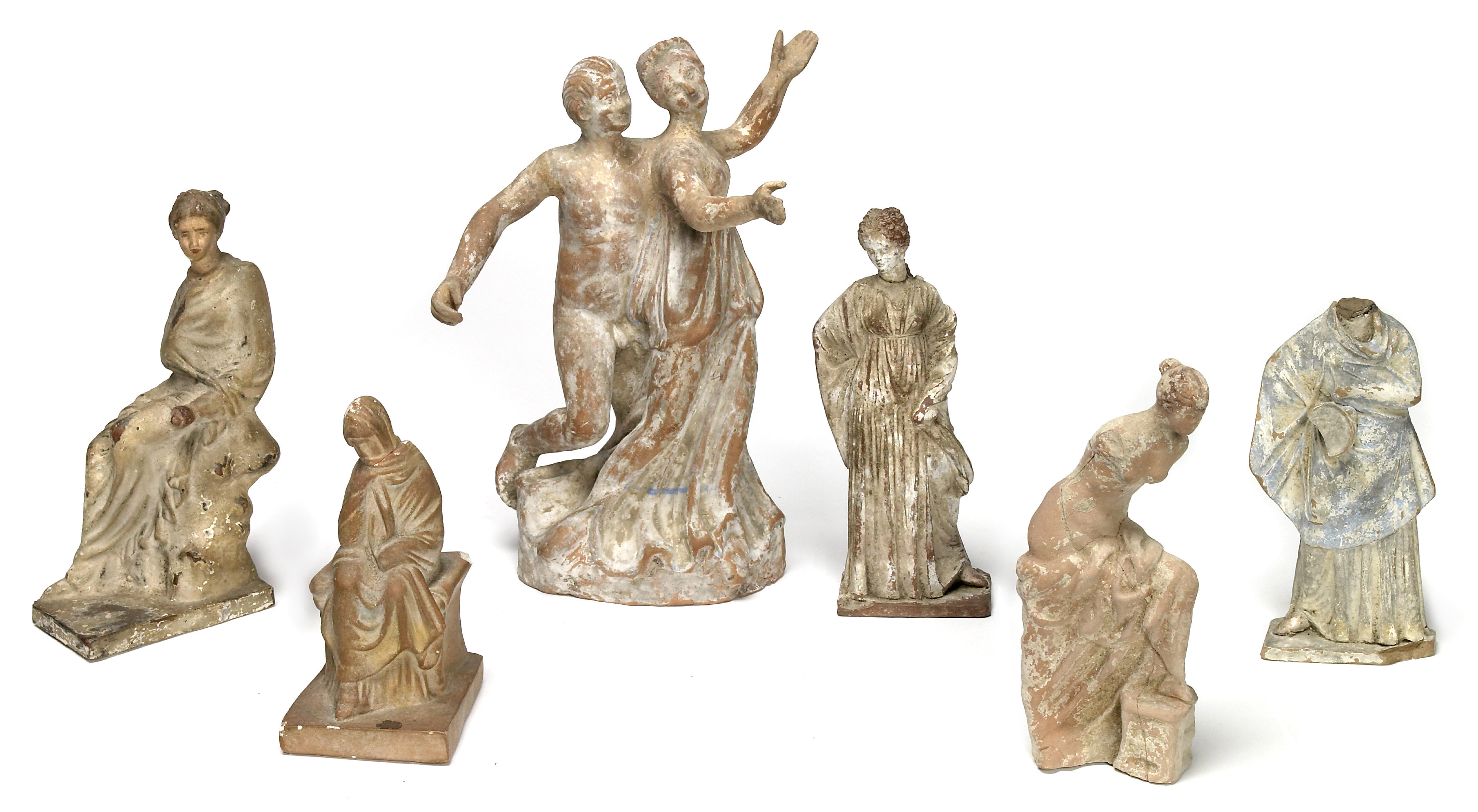 A group of six terracotta figures .