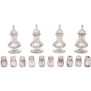 A Group of Sixteen Silver Casters
