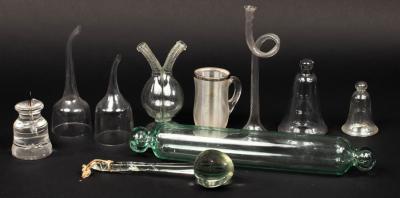 A group of small glass items,
