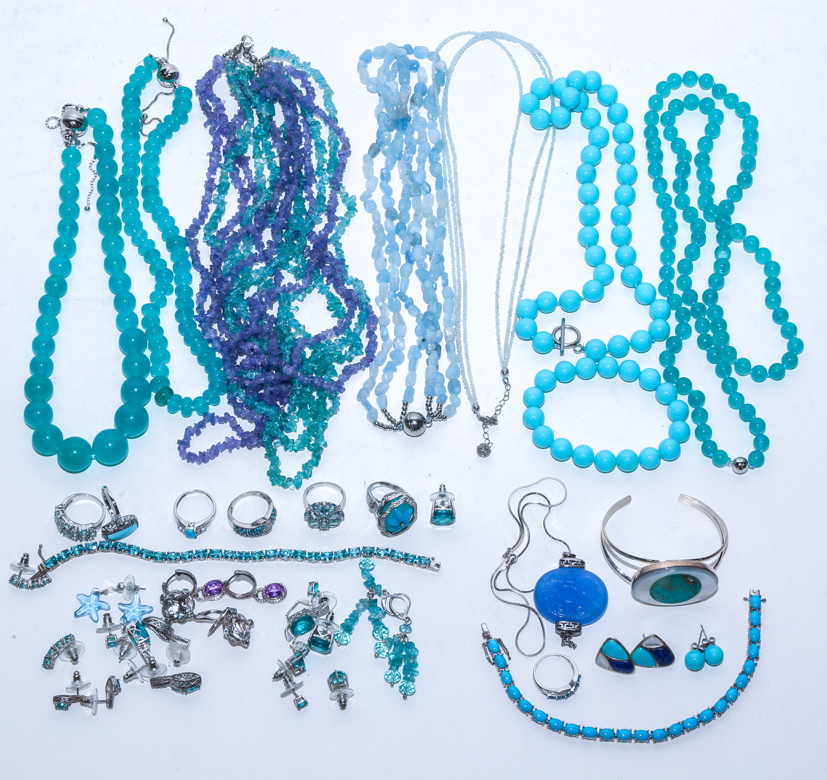 A GROUP OF TEAL-HUED STERLING &