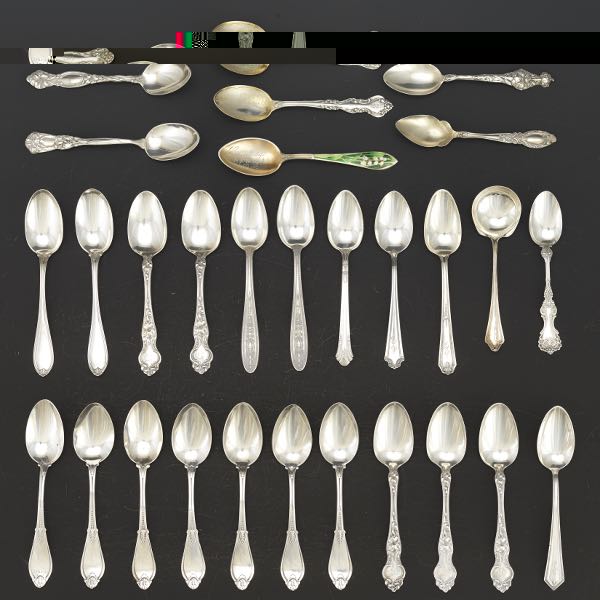 A GROUP OF TEASPOONS  28
