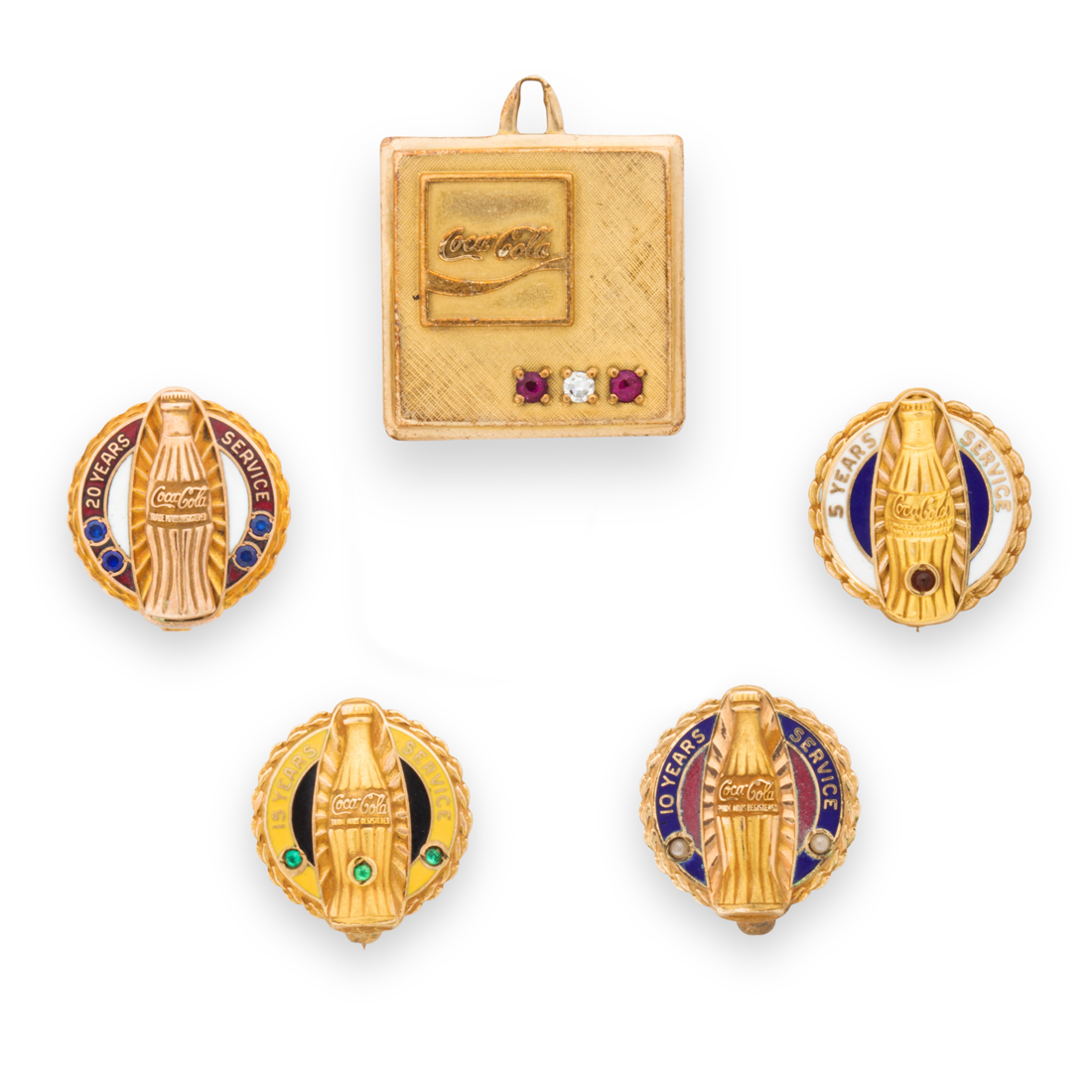 A GROUP OF TEN KARAT GOLD PINS OR