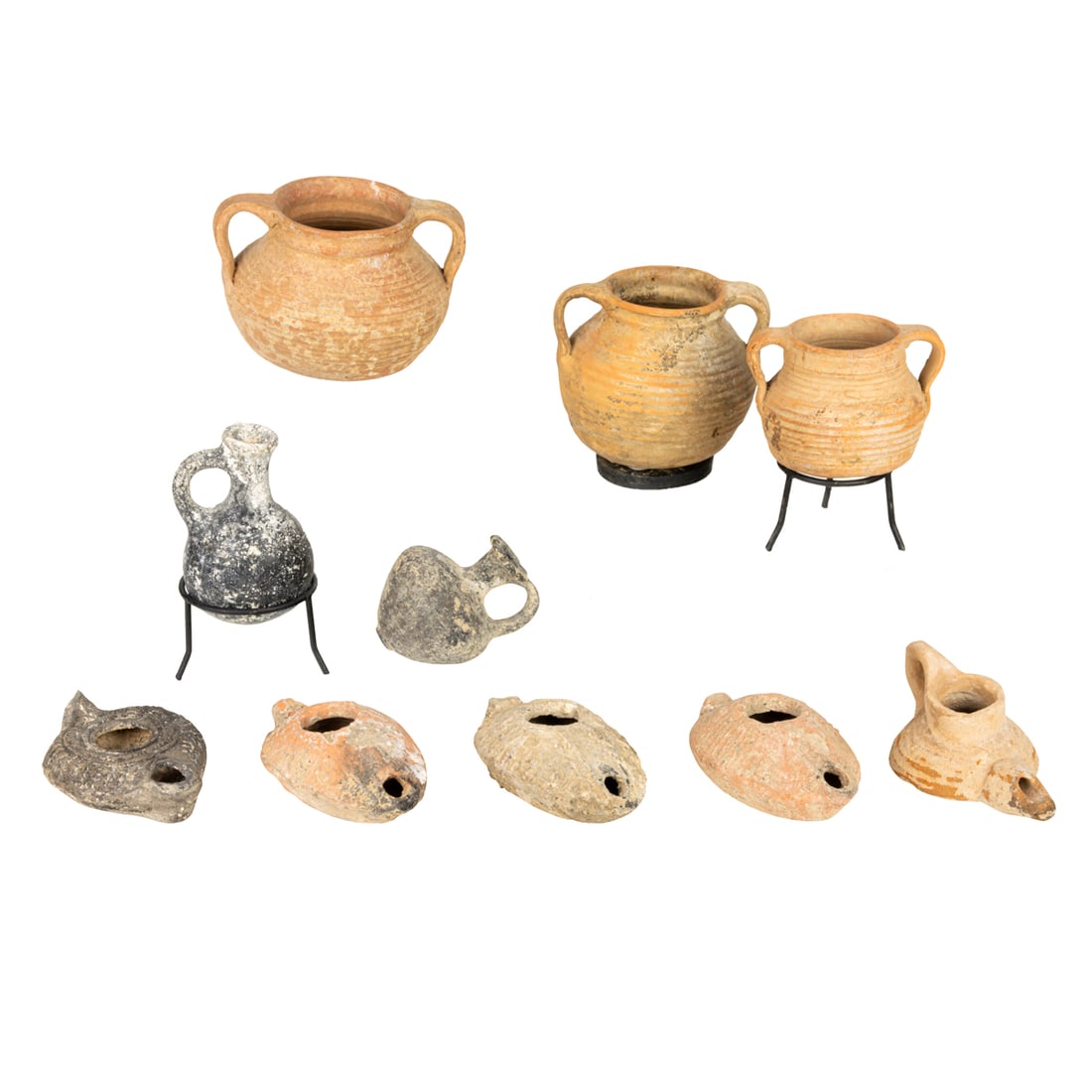 A GROUP OF TEN ROMAN TERRACOTTA