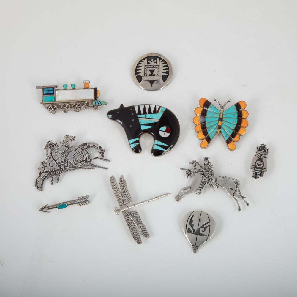 A GROUP OF TEN SILVER NATIVE