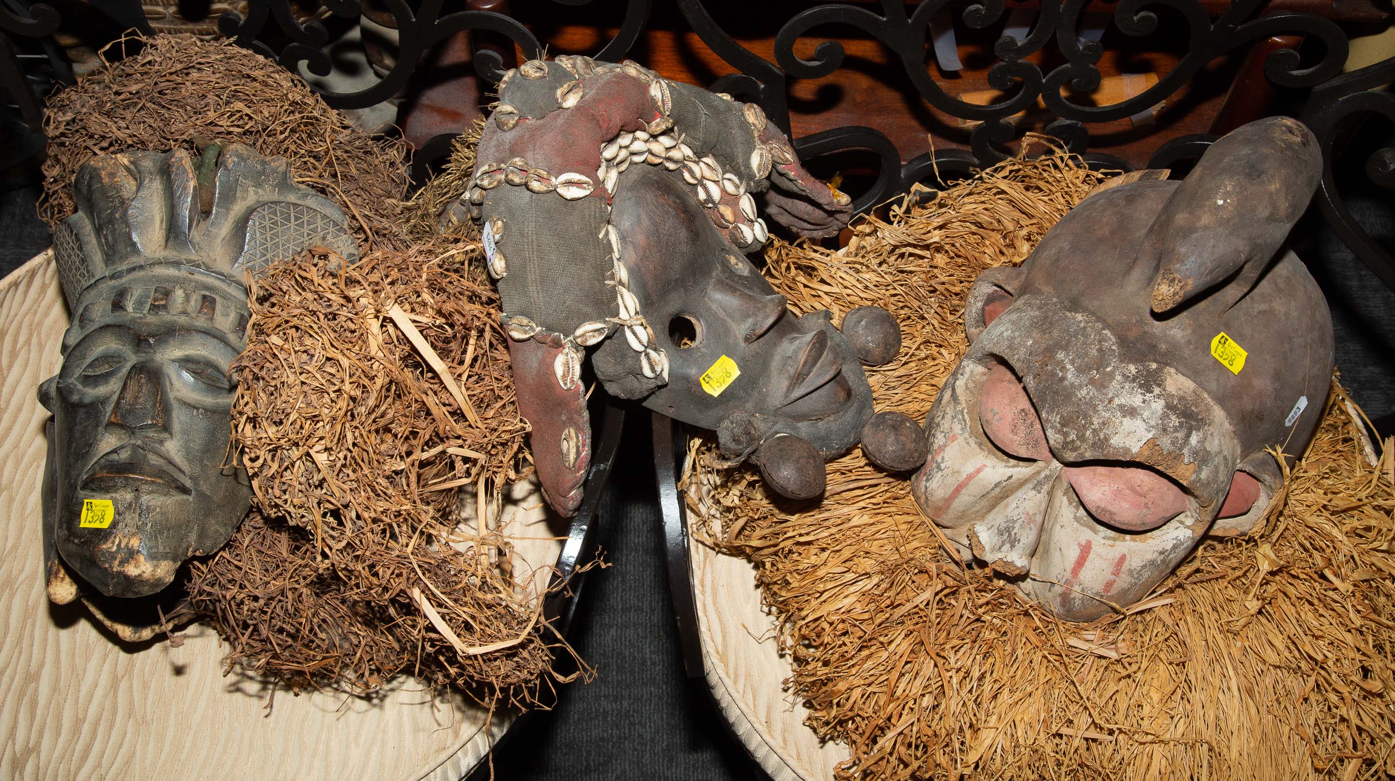 A GROUP OF THREE AFRICAN MASKS 20th