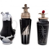 A Group of Three Black Glass C