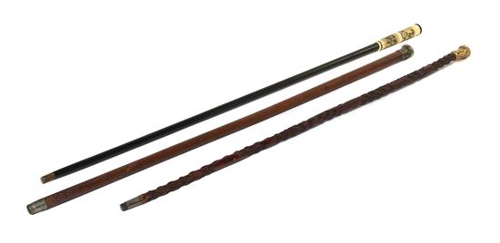 A Group of Three Canes comprising a