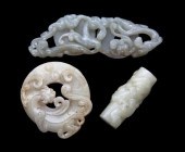 A Group of Three Carved Jade A