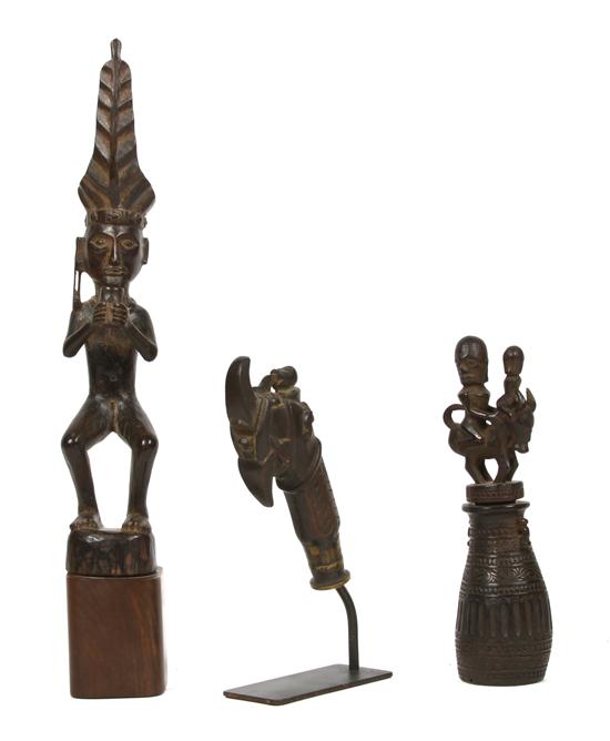A Group of Three Carved Wood