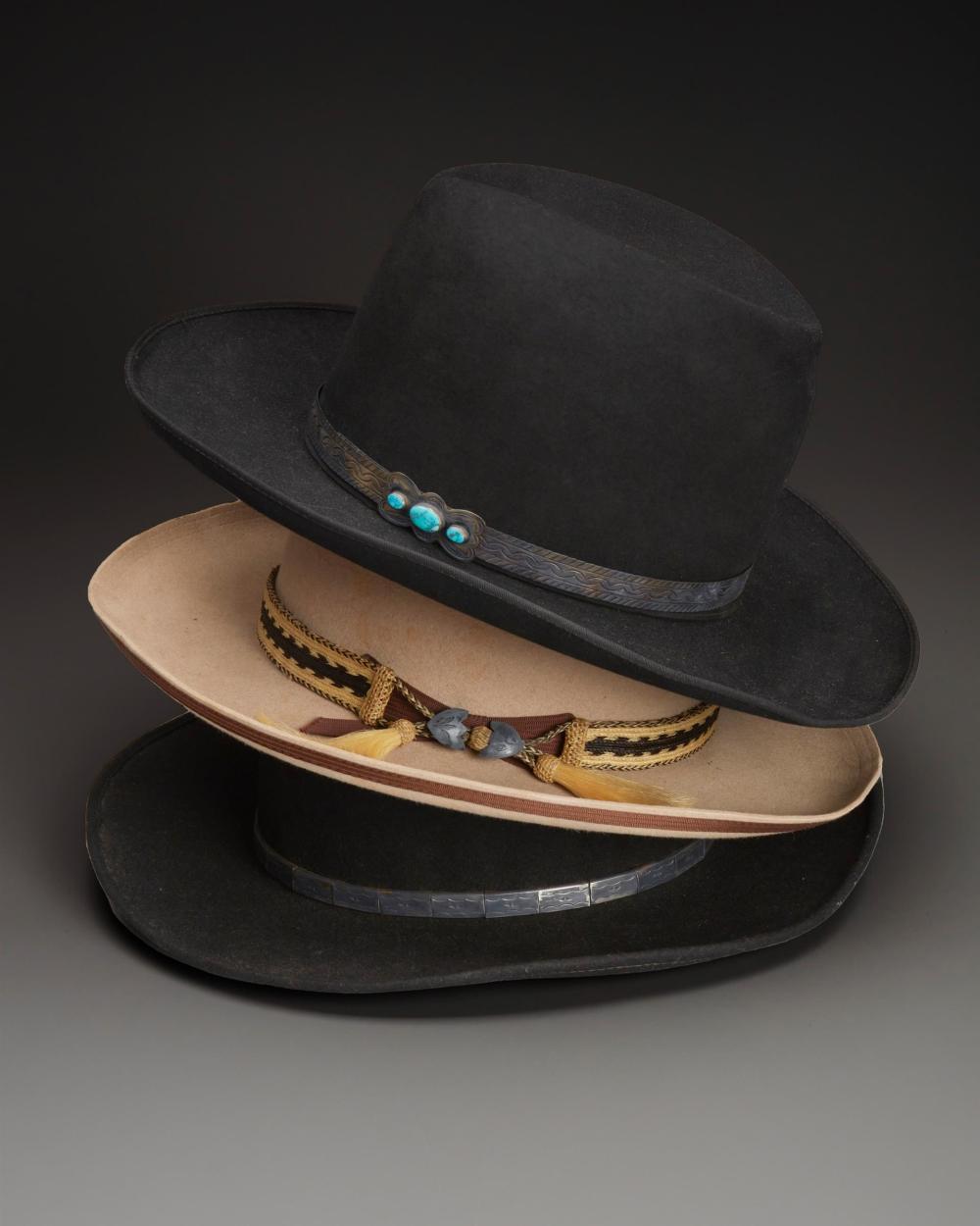 A GROUP OF THREE FELT HATS WITH HAT