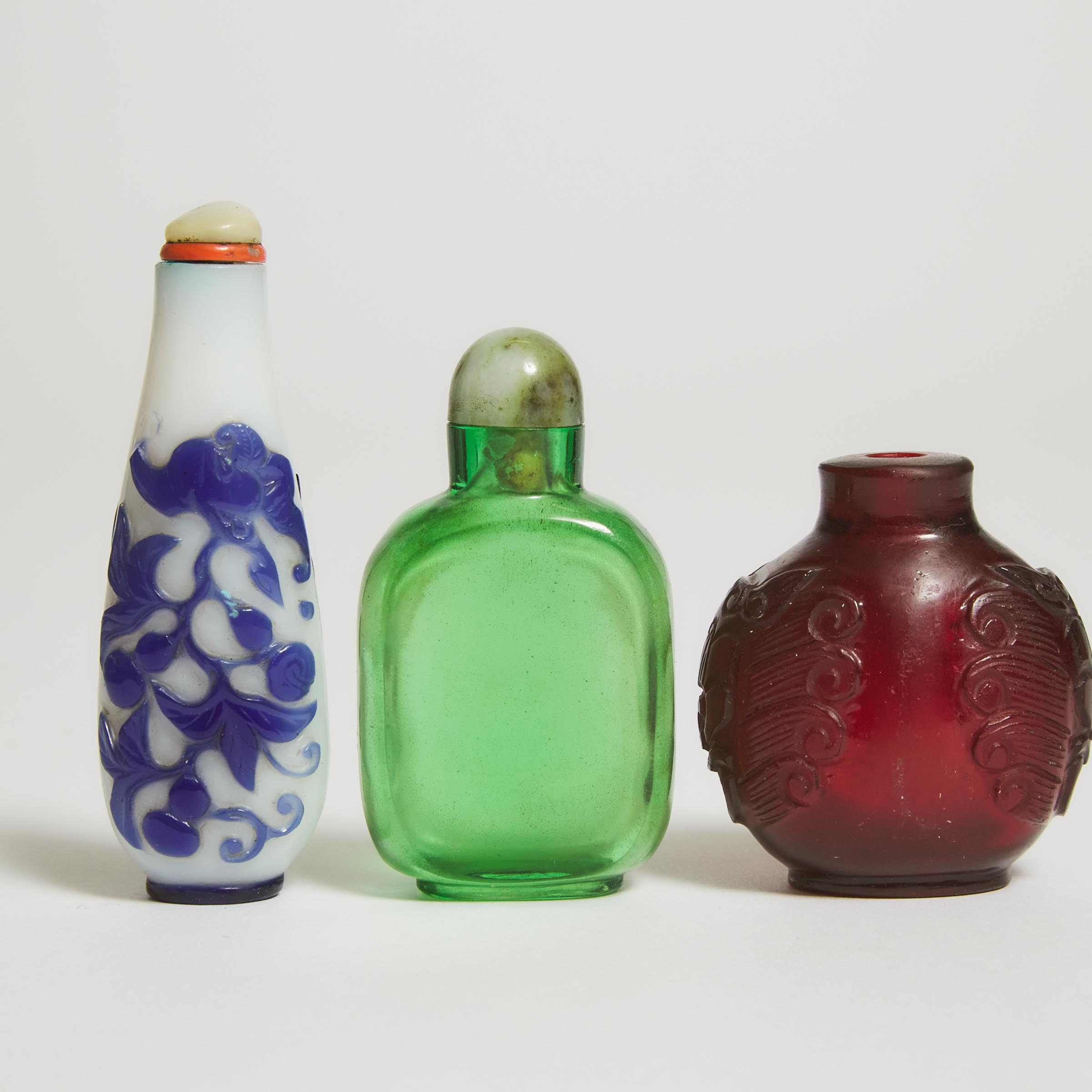 A Group of Three Glass Snuff