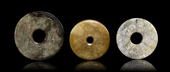 A Group of Three Jade Bi each