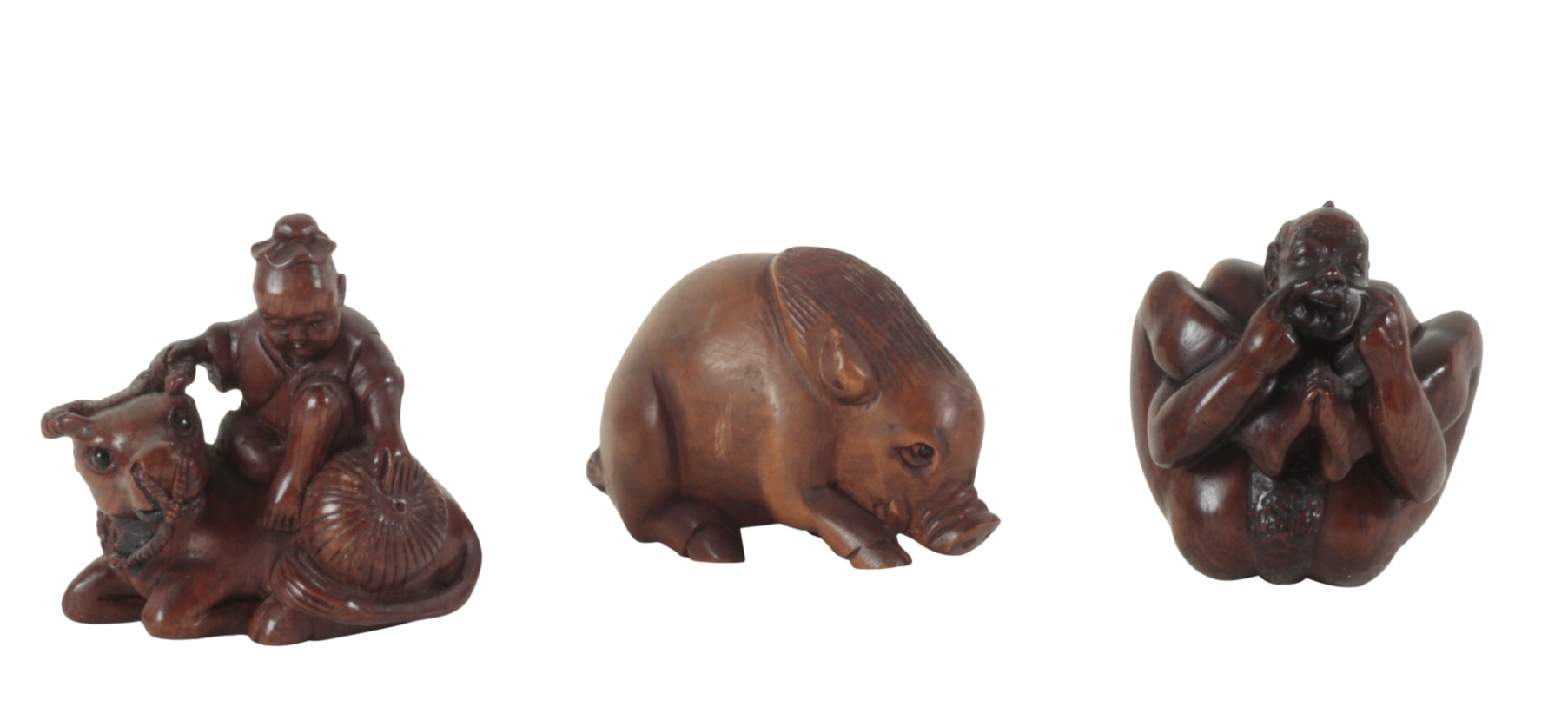 A GROUP OF THREE JAPANESE CARVED