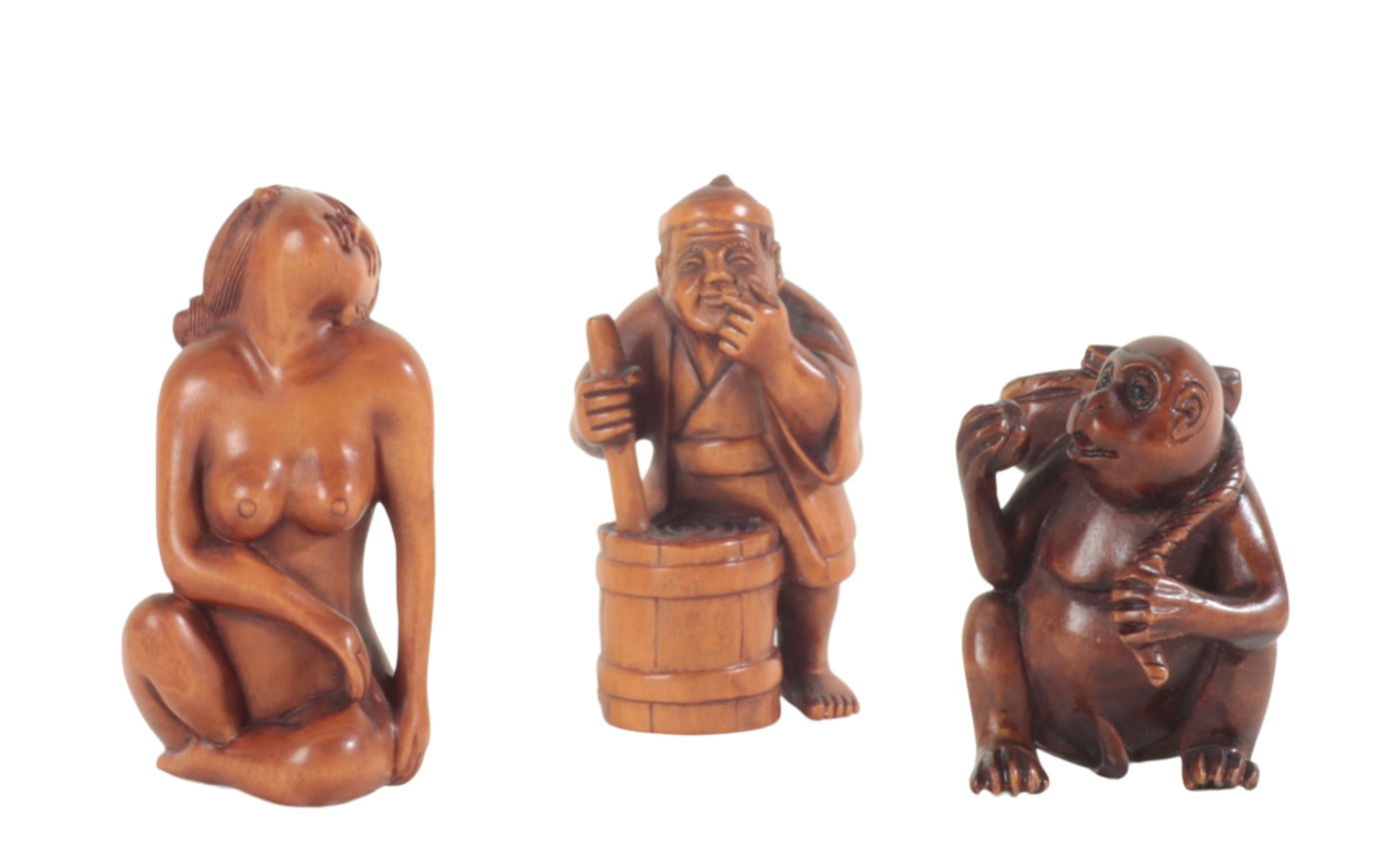 A GROUP OF THREE JAPANESE CARVED