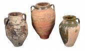 A GROUP OF THREE TERRACOTTA AM
