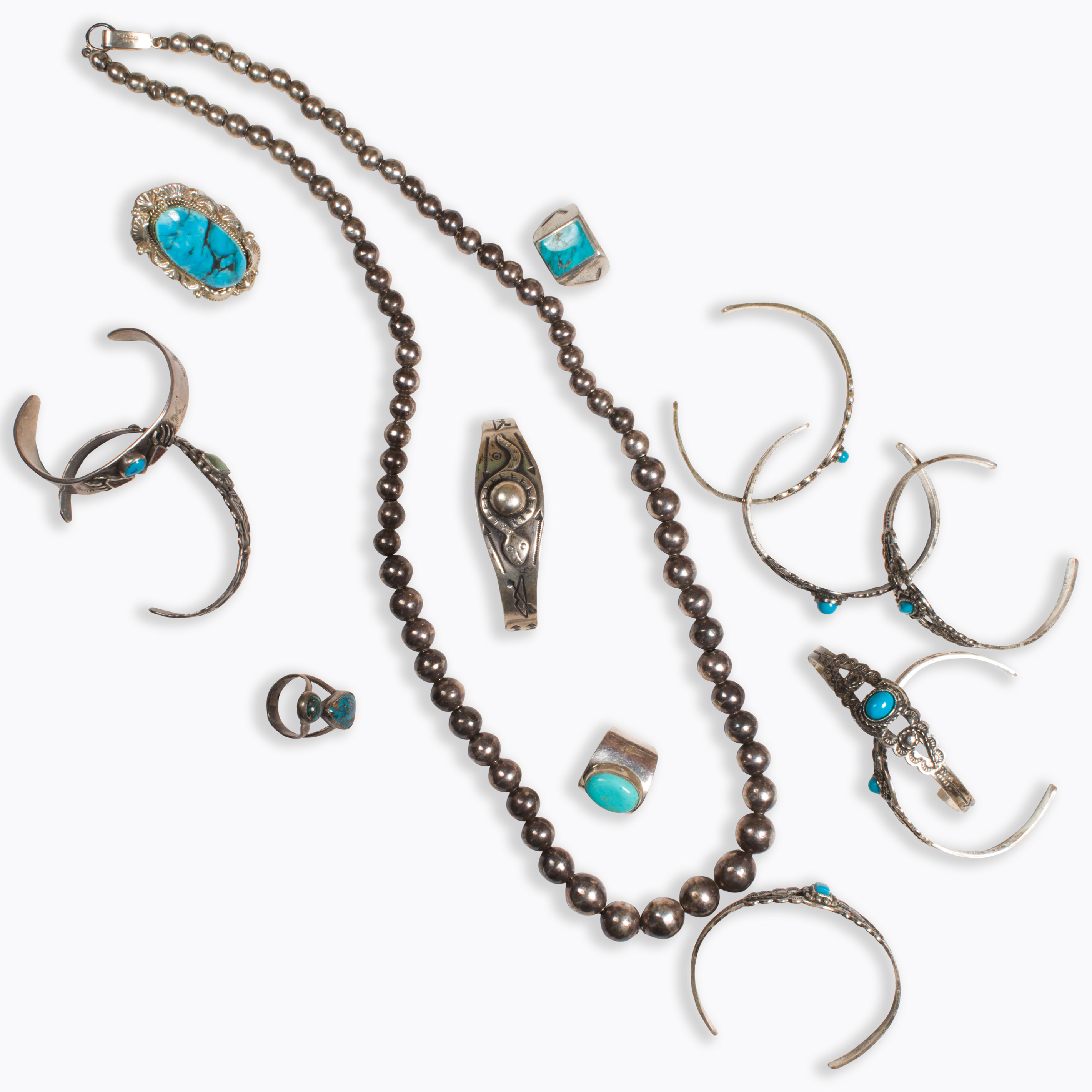 A GROUP OF TURQUOISE AND SILVER