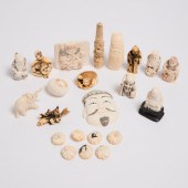A Group of Twenty-Two Ivory Ca