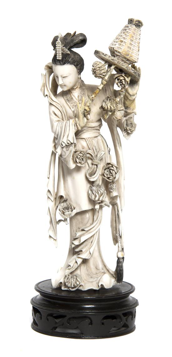 A Group of Two Carved Ivory Figures