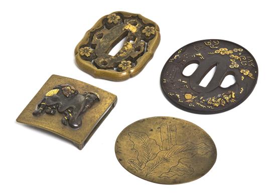 A Group of Two Tsuba comprising one