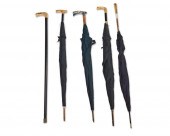 A GROUP OF UMBRELLAS AND A CAN