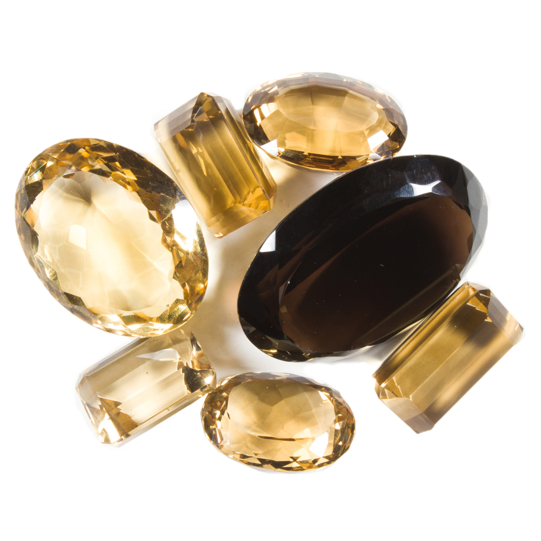 A GROUP OF UNMOUNTED CITRINE AND