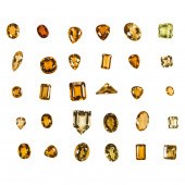 A GROUP OF UNMOUNTED CITRINES
