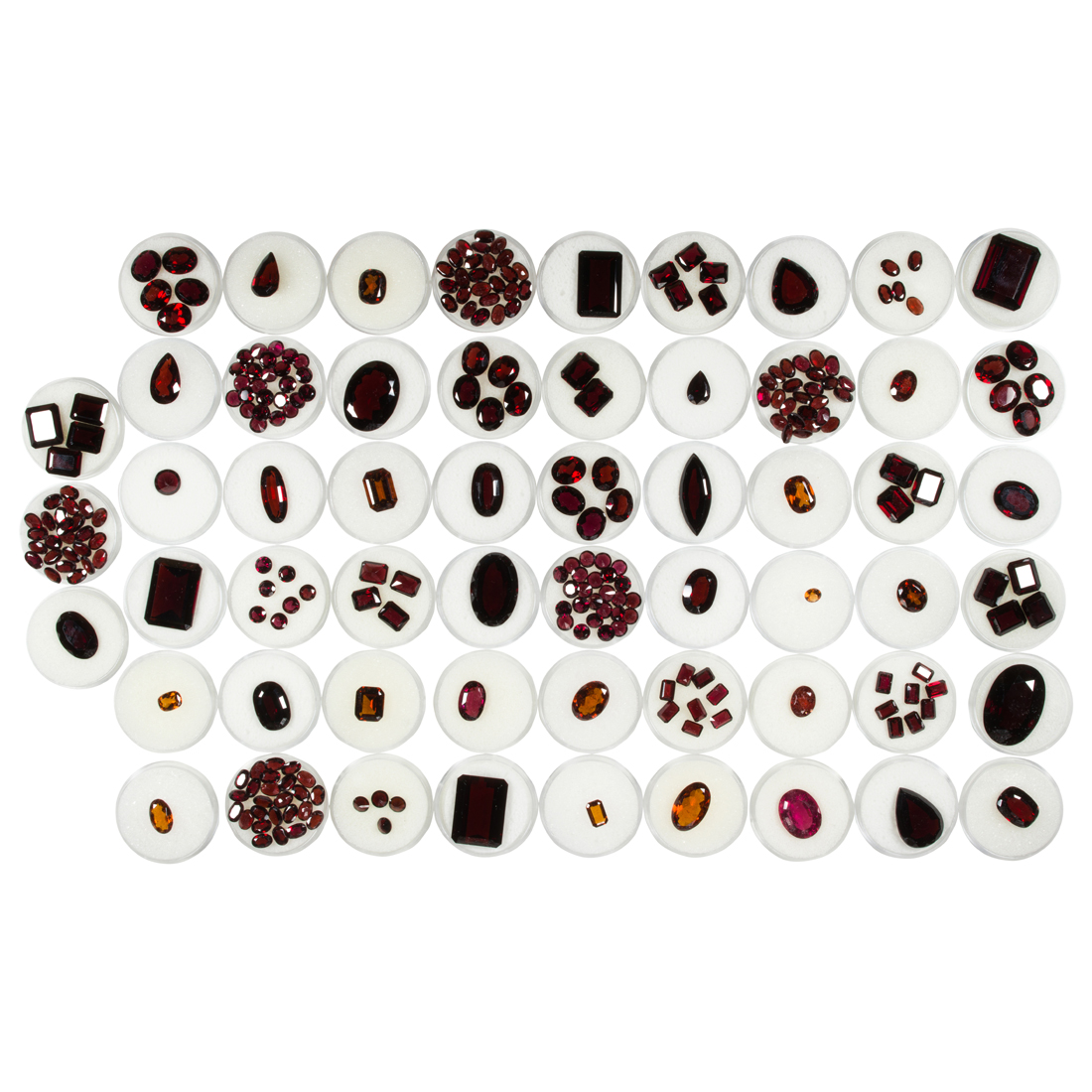 A GROUP OF UNMOUNTED GARNETS A