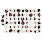 A GROUP OF UNMOUNTED GARNETS A