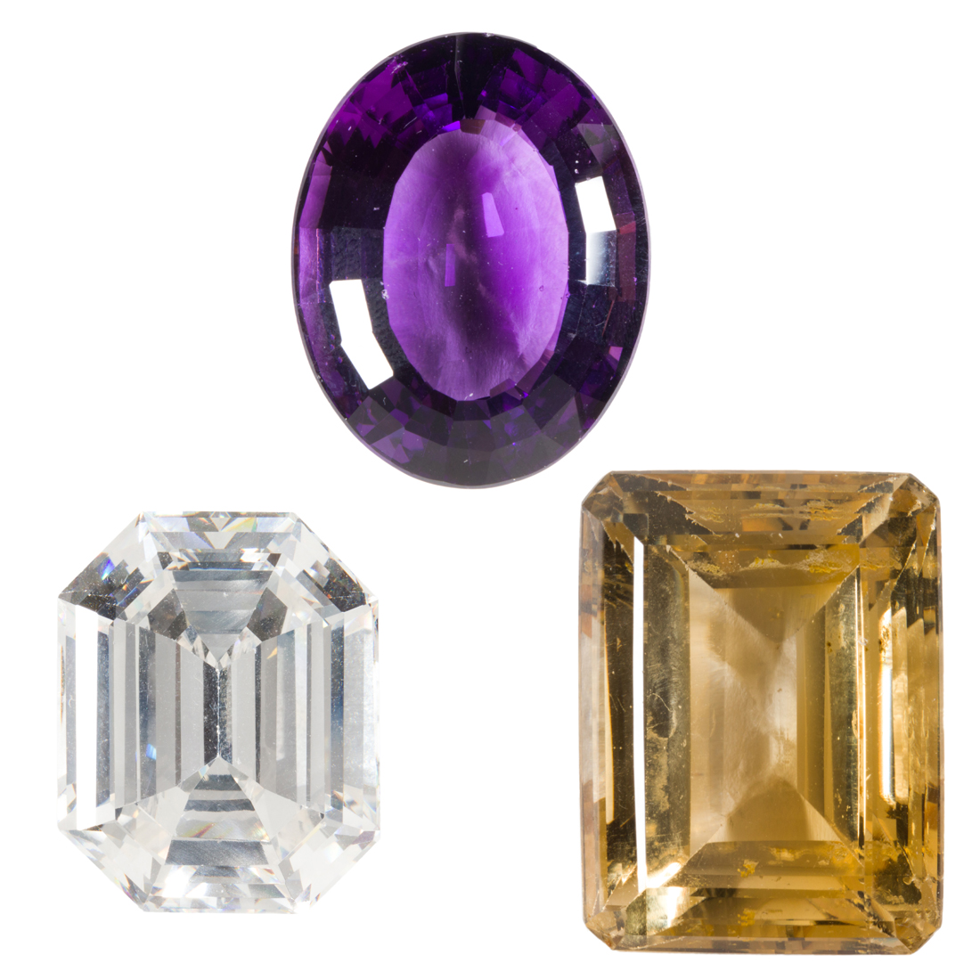 A GROUP OF UNMOUNTED GEMSTONES A