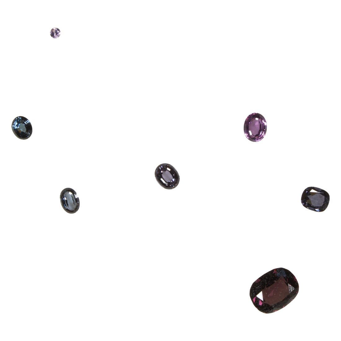 A GROUP OF UNMOUNTED SPINELS A