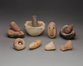 A GROUP OF VARIOUS STONE IMPLE