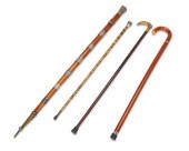 A GROUP OF WALKING STICKS AND