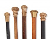 A GROUP OF WOOD WALKING CANESA