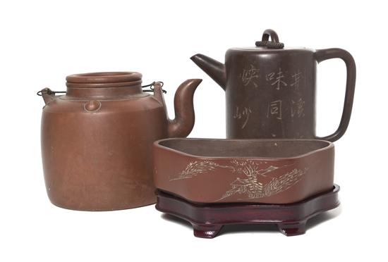 * A Group of Yixing Pottery Teapots