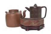 * A Group of Yixing Pottery Te