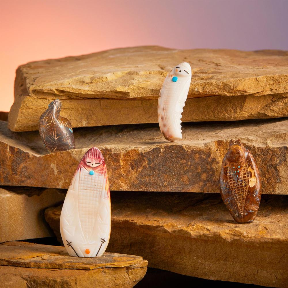 A GROUP OF ZUNI CARVED CORN