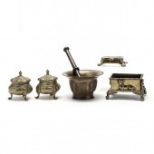 A GROUPING OF FIVE BRASS TABLE