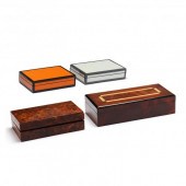A GROUPING OF FOUR DECORATIVE