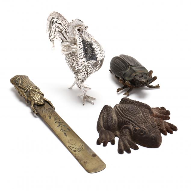 A GROUPING OF FOUR METAL ANIMAL