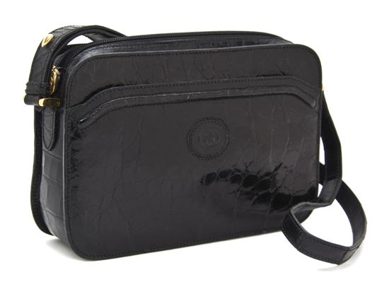 A Gucci Black Alligator Handbag.