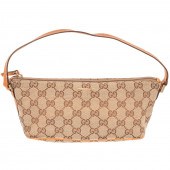 A GUCCI BOAT POCHETTE A beige