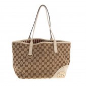 A GUCCI BRITT PM A beige and t