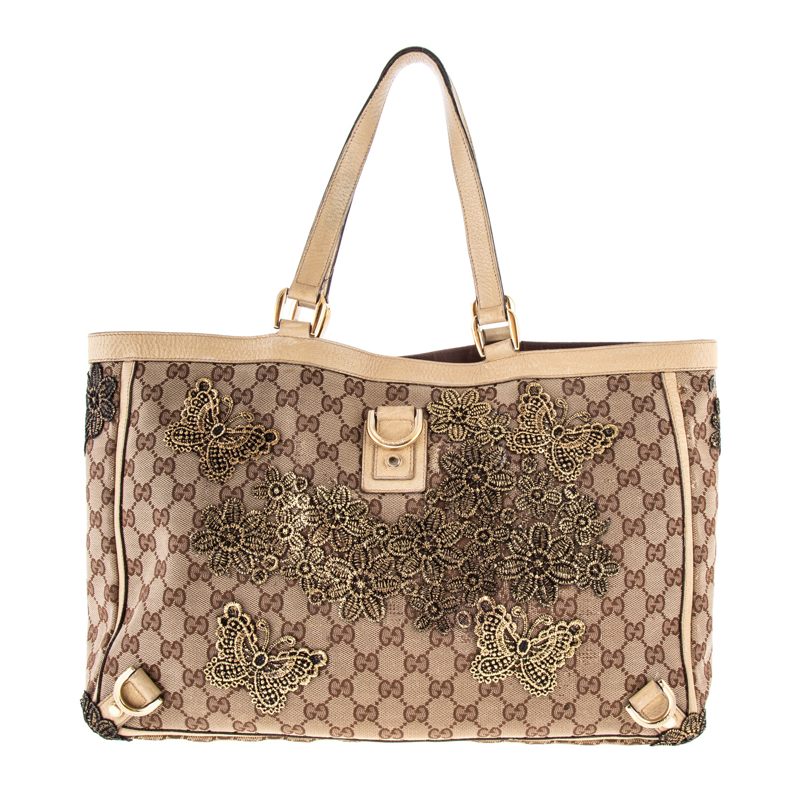 A GUCCI MONOGRAM ABBEY TOTE A brown